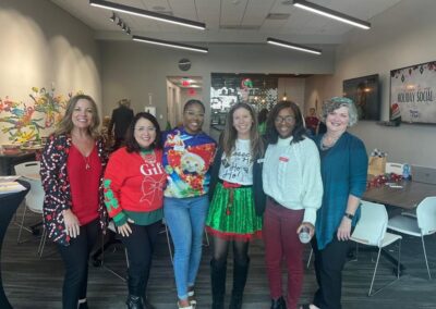 Diana with attendees during the holiday party