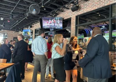Attendees network with one another during the family friendly business event in 2024.