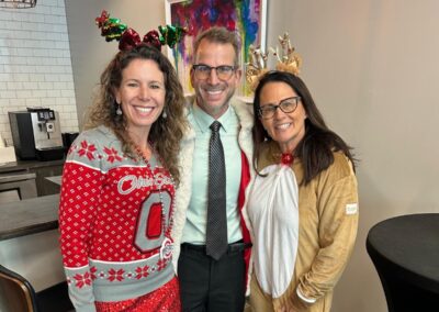 Thrive by Five Director, Diana Santangelo, poses for photo during the holiday party