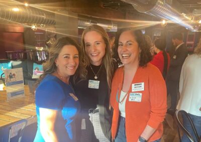 Businesspeople networking at the event.